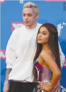  ??  ?? ARIANA GRANDE and Pete Davidson at Radio City Music Hall, New York on Aug. 20.