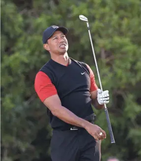  ??  ?? Tiger Woods finished at 3 under in the Farmers Insurance Open after shooting par 72 on Sunday in San Diego. ORLANDO RAMIREZ/USA TODAY SPORTS
