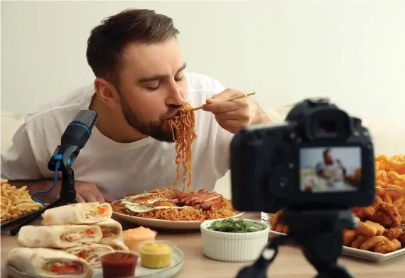  ?? Shuttersto­ck ?? The concept of the mukbang originated in South Korea and was intended to bring people together virtually over a meal, as eating is seen as a social activity and doing so alone is considered depressing.