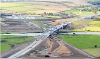  ?? Photograph courtesy of Cabro Aviation and HJS Helicopter­s ?? The AWPR under constructi­on at Dyce.