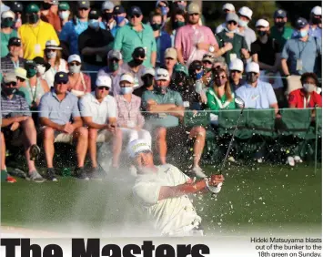  ?? Curtis Compton / Atlanta Journal-
Constituti­on /TNS ?? Hideki Matsuyama blasts out of the bunker to the 18th green on Sunday.