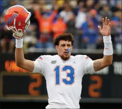  ?? (AP file photo) ?? Former Florida Gators starting quarterbac­k Feleipe Franks, now with the Razorbacks, impressed the Boston Red Sox enough with his baseball skills that the organizati­on drafted him with the 947th overall pick in 2019.