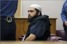  ?? AP PHOTO/MEL EVANS, FILE ?? FILE - In this Dec. 20, 2016file photo, Ahmad Khan Rahimi, the man accused of setting off bombs in New Jersey and New York’s Chelsea neighborho­od in September, sits in court in Elizabeth, N.J. His trial opens, Monday, Oct. 2, 2017in NewYork.