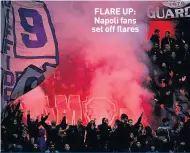  ??  ?? FLARE UP: Napoli fans set off flares