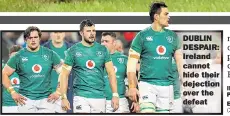  ??  ?? DUBLIN DESPAIR: Ireland cannot hide their dejection over the defeat