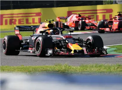  ?? FOTO: AFP / LEHTIKUVA/TOSHIFUMI KITAMURA ?? ■Red Bulls Max Verstappen spolierade Kimi Räikkönens lopp igen.