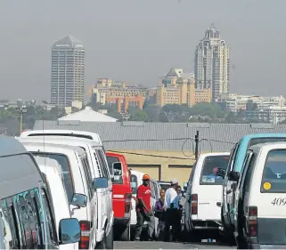  ?? /File picture ?? Taxi travellers: The Competitio­n Commission is conducting hearings on transport and will decide, among other things, how a subsidy system might work for the minibus-taxi industry, which ferries the majority of commuters in SA.