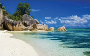  ?? Getty ?? Granite boulders line the beach on La Digue island in the Seychelles