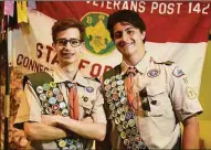  ?? Tyler Sizemore / Hearst Connecticu­t Media ?? Matan Coll, left, and Jordan Bowbeer pose together during the Boys Scouts of America Stamford Troop 15 Eagle Scout Court of Honor ceremony at Temple Sinai in Stamford on Sunday, June 5. Westhill High School senior Matan Coll and Greenwich High School senior Jordan Bowbeer were honored in a ceremony Sunday as they achieved the rank of Eagle Scout.