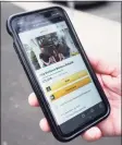  ?? Tyler Sizemore / Hearst Connecticu­t Media ?? Business owner Kyle Benevelli shows the GoFundMe page “Help Belltown Barbers Rebuild” that has raised more than $25,000 so far.