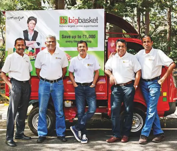  ?? Bloomberg ?? ■ Hari Menon, co-founder and chief executive officer of Bigbasket, second left, with fellow co-founders VS Ramesh, from left, Vipul Parekh, Abhinay Choudhari and V.S. Sudhakar in Bengaluru. Bangalore-based Bigbasket delivers everyday cooking essentials...