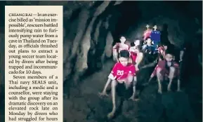  ?? AFP ?? The children are seen in a video taken by rescuers inside the Tham Luang cave in Thailand on Monday. —