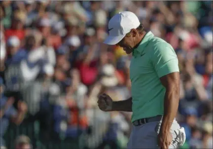  ?? CHRIS CARLSON — THE ASSOCIATED PRESS ?? Brooks Koepka reacts on the 18th hole during the fourth round of the U.S. Open golf tournament Sunday at Erin Hills in Erin, Wis.