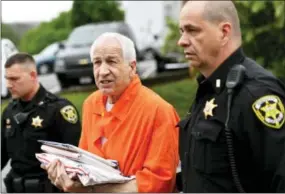  ?? THE ASSOCIATED PRESS ?? Former Penn State University assistant football coach Jerry Sandusky arrives at the Centre County Courthouse on Monday for arguments on his request for an evidentiar­y hearing in Bellefonte, Pa.