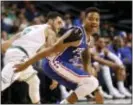  ?? THE ASSOCIATED PRESS FILE ?? Sixers rookie guard Markelle Fultz, shown during an exhibition game in Boston in October, seems to be close to returing to full practices with his team.