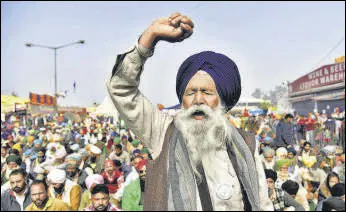  ?? ANI ?? A farmer shouts slogans during a protest against the farm bills at Singhu Border in New Delhi.