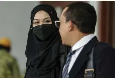  ?? ?? Emilia arrives at the Kuala Lumpur Court Complex. — Bernama photos