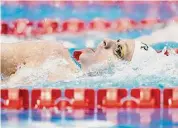  ?? Eugene Hoshiko/Associated Press ?? Leon Marchand of France won the men’s 200-meter individual medley in 1 minute, 54.82 seconds.