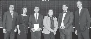  ??  ?? Bank of the Philippine Islands (BPI) accepts The Remittance Product and Service of the Year award from The Asian Banker. From left: Foo Boon Ping, Managing Editor, The Asian Banker; Bess Aguinaldo, Product Marketing Manager, BPI; Manuel "Noel" Tagaza, SVP and Head of Remittance and Fund Transfers Group, BPI; Melinda “Mutley” V. Dulay, VP and Head of Inward Remittance, BPI; David Gyori, Internatio­nal Resource Director, The Asian Banker; Richard Hartung, Internatio­nal Resource Director, The Asian Banker.