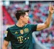  ?? ?? In grünen Trikots sieht man die Fußbal‰ ler des FC Bayern, wie Robert Lewan‰ dowski, nicht so oft.