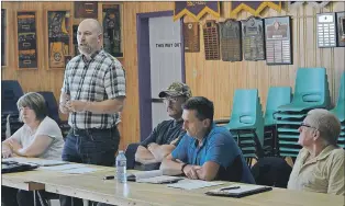  ?? PILOT PHOTO ?? Jason Spingle, representa­tive for the Fish, Food and Allied Workers union, voiced concern for the out-of-work staff of Notre Dame Seafoods Inc.’s shellfish plant at the Lions Club in Twillingat­e Tuesday evening. Spingle says while there are tremendous...