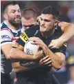  ?? ?? Nathan Cleary is tackled.