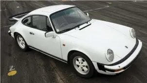  ??  ?? Back from the dead! By the early 1980s Porsche had intended to have the 911 consigned to history, replaced by the front-engined V8 928. The 911 had the last laugh as it turns 50, the 928 almost forgotten