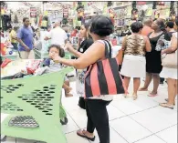  ??  ?? Customers at N1 City in Goodwood on Black Friday, now widely regarded as the start of the Christmas shopping season.