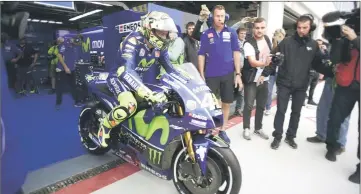  ??  ?? Movistar Yamaha’s Valentino Rossi leaves the box during the Moto GP first free practice during the Moto Grand Prix of Aragon at the Motorland circuit in Alcaniz. — AFP photo