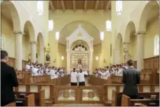  ?? NATI HARNIK — THE ASSOCIATED PRESS ?? Members of the Priestly Fraternity of Saint Peter, a Catholic order formed in 1988, perform a Gregorian chants at Our Lady of Guadaloup seminary in Denton, Neb.