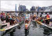  ?? XINHUA ?? Dragon Boat teams are seen during a race at Darling Harbour in Sydney, Australia, on Feb 5.