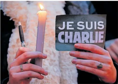  ?? FOTO: JULIEN WARNAND/DPA ?? Nach dem Anschlag auf das Satire-Magazin „Charlie Hebdo“in Paris 2015 gab es eine große Welle der Solidaritä­t.