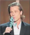  ?? Robert Gauthier Los Angeles Times ?? BRAD PITT gives his Actor a little buss during acceptance speech at the SAG Awards.