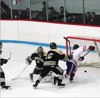  ?? Photo by Ernest A. Brown ?? Hendricken goalie Patrick Gribbin (35), of Lincoln, has been the best goalie in the state this season. Gribbin has allowed just 1.63 goals a game with a save percentage of .908. He was also the MVP of the MSC Holiday FaceOff in December.