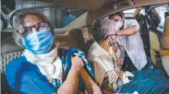  ?? PTI ?? GOOD IDEA, BAD PLANNING: Experience of a drive-through vaccinatio­n programme at Gurugram