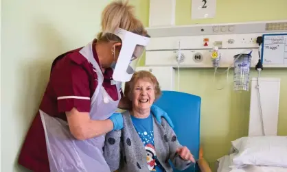 ?? Photograph: Jonny Weeks/Getty Images ?? ‘On Tuesday the UK delivered the first dose, to 90-year-old Margaret Keenan in Coventry.’ Margaret Keenan with healthcare assistant Lorraine Hill.