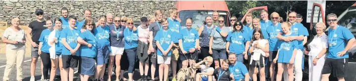  ??  ?? Beech Hall Pupil swimmers and supporters at the Great North Swim at Lake Windermere