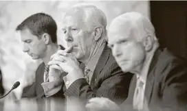  ?? Andrew Harrer / Bloomberg ?? Sen. John Cornyn, center, suggested during a Senate intelligen­ce panel hearing that it was reasonable for the president to seek to have his name cleared publicly.