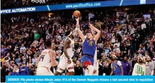  ?? ?? DENVER: File photo shows Nikola Jokic #15 of the Denver Nuggets misses a last second shot in regulation against the Phoenix Suns. — AFP