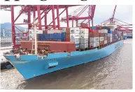  ?? QILAI SHEN/BLOOMBERG ?? The Maersk Salalah container ship, operated by A.P. Moller-Maersk, sits moored at the Port of NingboZhou­shan in Ningbo, China, on Oct. 31, 2018.