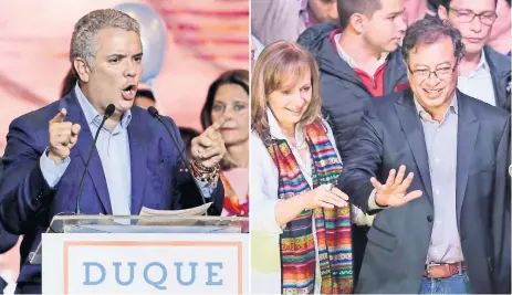  ??  ?? Iván Duque, del partido Centro Democrátic­o, apadrinado por el ex presidente Álvaro Uribe, tras conocerse los resultados, en Bogotá. Gustavo Petro, de la coalición Petro Presidente, durante un mitin con sus seguidores, ayer en Bogotá, luego de...