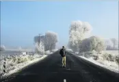  ??  ?? Stu Hardisty,
of Northeast Valley writes: ‘‘July 2015, on the Taieri plain heading towards Waipori. Standing in the middle of the road is my brother Jeff Hardisty, staring into the sun as it breaks through the hoar frost.’’