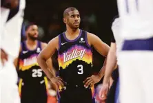  ?? Christian Petersen / Getty Images ?? Guard Chris Paul and the rest of the Suns were left befuddled by Sunday’s Game 7 rout by the Mavericks in Phoenix.