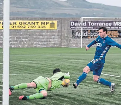  ??  ?? East Fife goalkeeper Brett Long saved Mitch Megginson’s penalty and also denies the Cove striker’s follow-up attempt