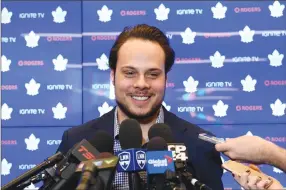  ?? Canadian Press photo ?? Toronto Maple Leafs centre Auston Matthews smiles at a press conference in Toronto on Tuesday. The Leafs locked up the scoring star with a five-year contract extension.