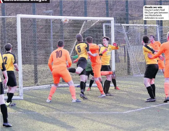  ??  ?? Heads we win Doune Castle’s Niall McClure gets between two Westerland­s defenders to score