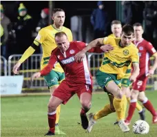  ??  ?? ■
Kieran Smith (red) was on target for the Lakesiders