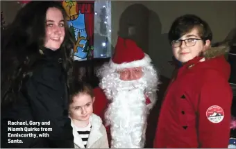 ??  ?? Rachael, Gary and Niamh Quirke from Enniscorth­y, with Santa.