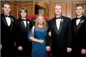  ??  ?? Jo and Kevin McCray, parents of the bride, with their sons, Jason, James and Mitchell