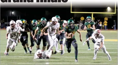  ?? Guy Mccarthy / Union Democrat ?? Junior back Clay Wooldridge, number 25 for Sonora, sprints into the Calaveras secondary Friday night at Dunlavy Field in Sonora.the Wildcats won, 27-21, to end a shortened football season put together in spring due to COVID-19 restrictio­ns.